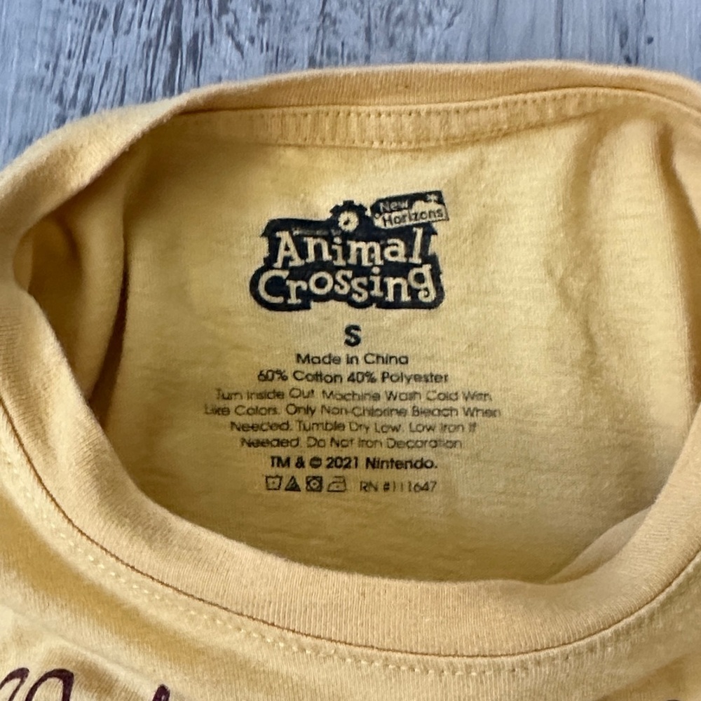 Junior’s Yellow Animal Crossing Graphic T-Shirt with Character Faces - Picture 4 of 4